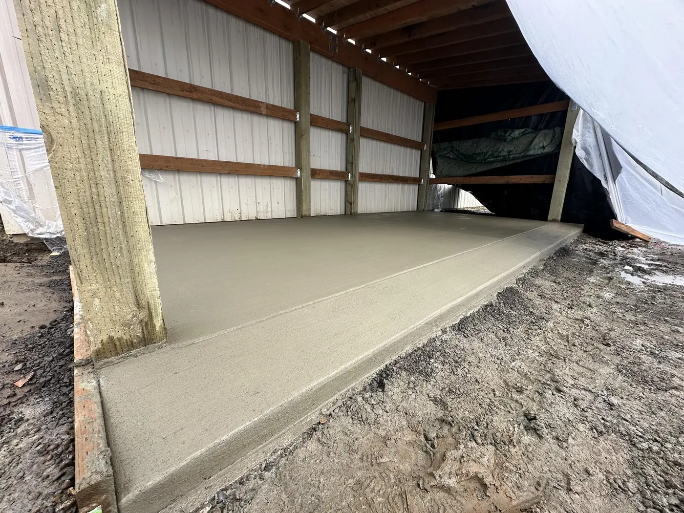New concrete slab inside a framed structure